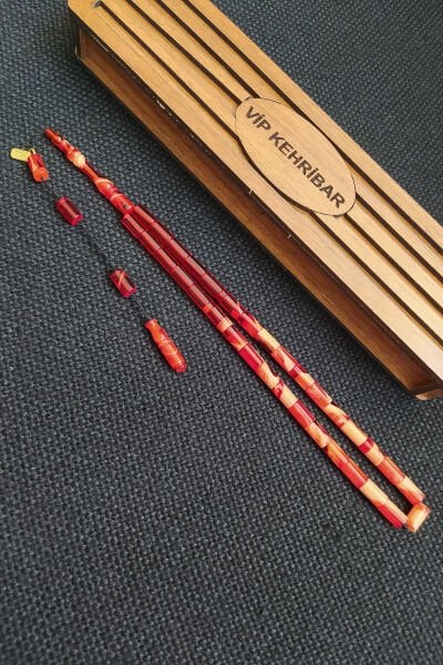 5,5x10 mm Kesme Ateşi Kehribar Tesbih Ayhan Turan Usta İşçilikli İmzalı Sistemli Tespih Ahşap Kutulu