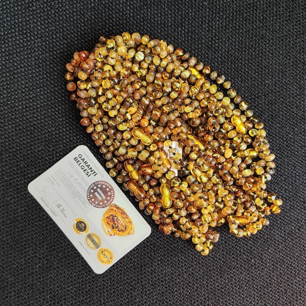5.5 Gram Fosilli Kehribar Bebek Diş Kolyesi