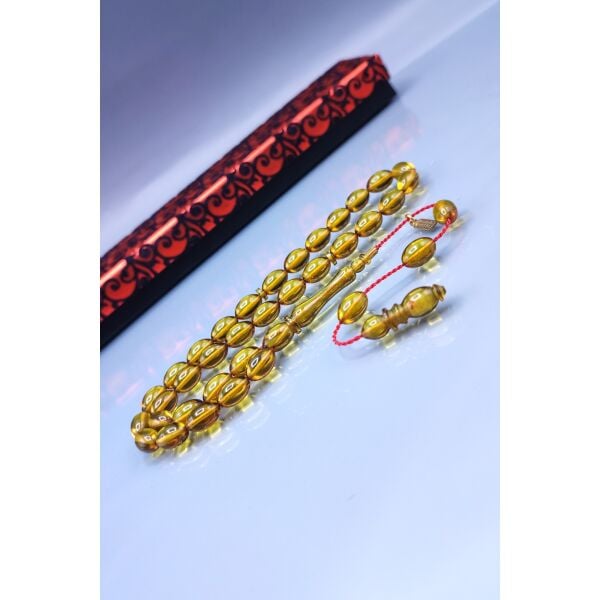 7x11 mm Mustafa Uysal İmzalı Altın Rengi Ateşi Kehribar Tesbih