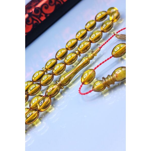 7x11 mm Mustafa Uysal İmzalı Altın Rengi Ateşi Kehribar Tesbih