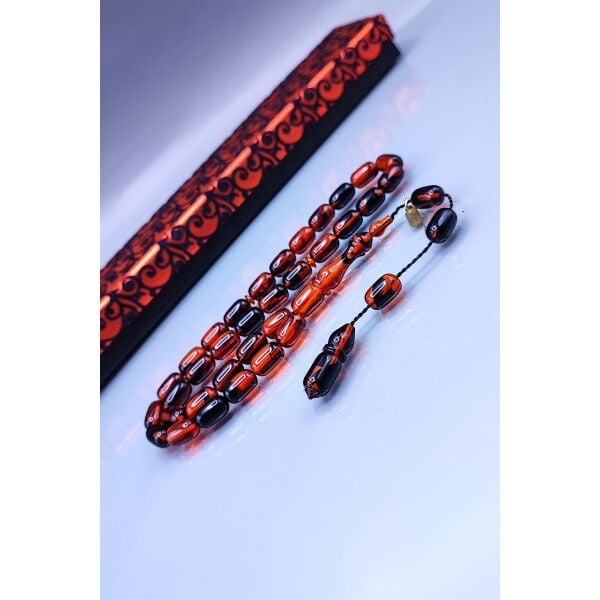7x11 mm Kapsül Mustafa Uysal İmzalı Turuncu Siyah Ateşi Kehribar Tesbih