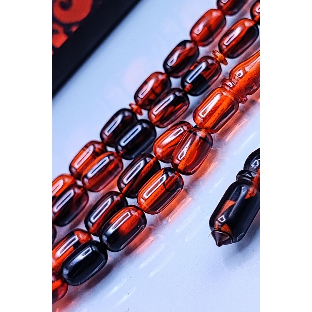 7x11 mm Kapsül Mustafa Uysal İmzalı Turuncu Siyah Ateşi Kehribar Tesbih