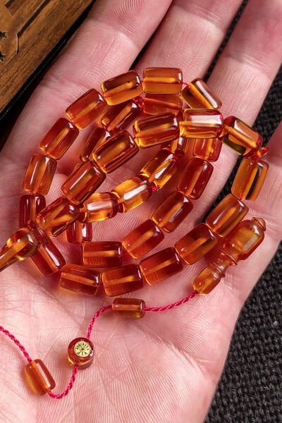 İmzalı 7X11 mm Altın Rengi Ateşi Kehribar Tesbih - Usta İşçilikli Zar Kehribar - Şeffaf Delim Kesme