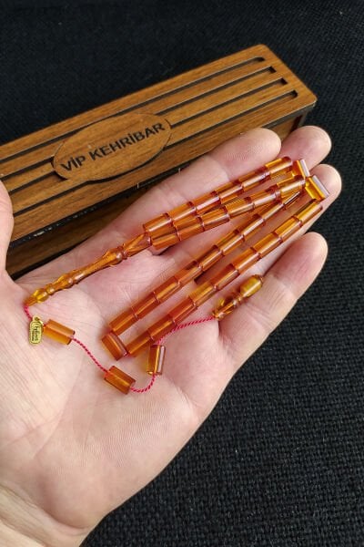 5,5x10 mm Kesme Ateşi Kehribar Tesbih Ayhan Turan Usta İşçilikli İmzalı Sistemli Tespih Ahşap Kutulu