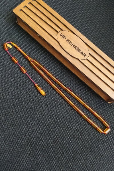 5,5x10 mm Kesme Ateşi Kehribar Tesbih Ayhan Turan Usta İşçilikli İmzalı Sistemli Tespih Ahşap Kutulu