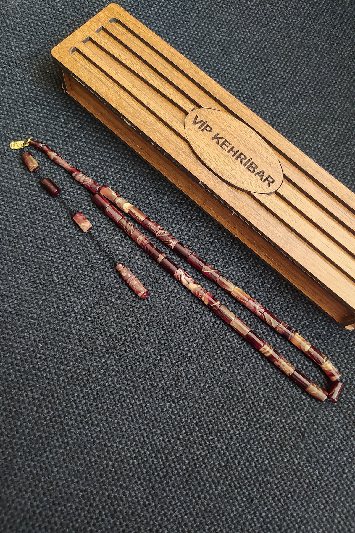 5,5x10 mm Kesme Ateşi Kehribar Tesbih Ayhan Turan Usta İşçilikli İmzalı Sistemli Tespih Ahşap Kutulu