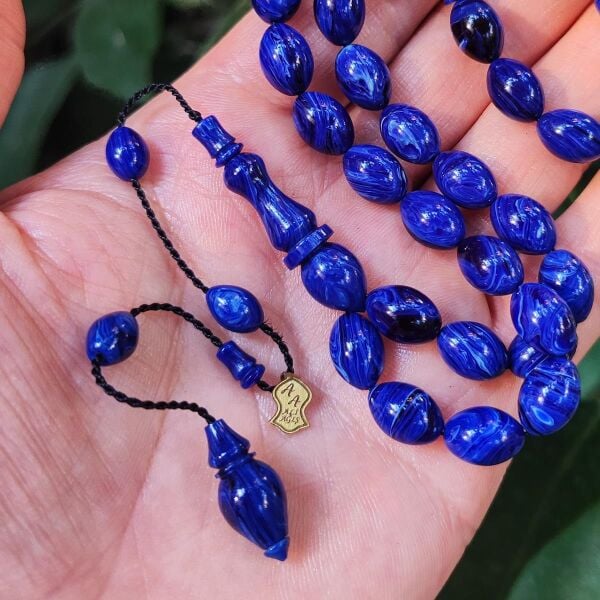 8x11 mm Ali Agiş Usta İşçilikli Mavi Hareli Sıkma Kehribar Tesbih - Şeffaf Delim Tespih