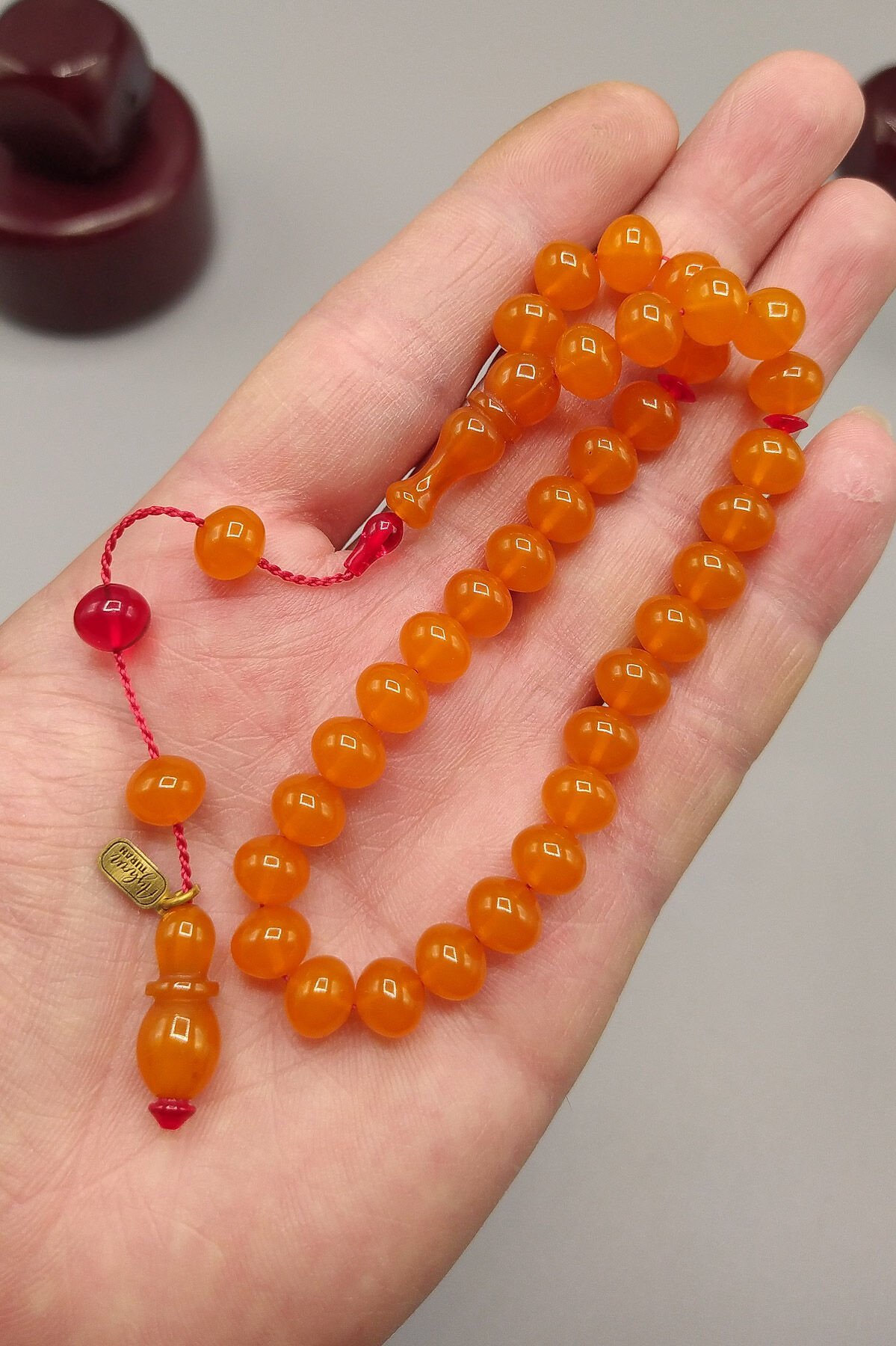 Ayhan Turan Usta İşçilikli Ateş Kehribar Tesbih 7*8 mm Basık Küre Bilekboy Sistemli İmzalı Tespih