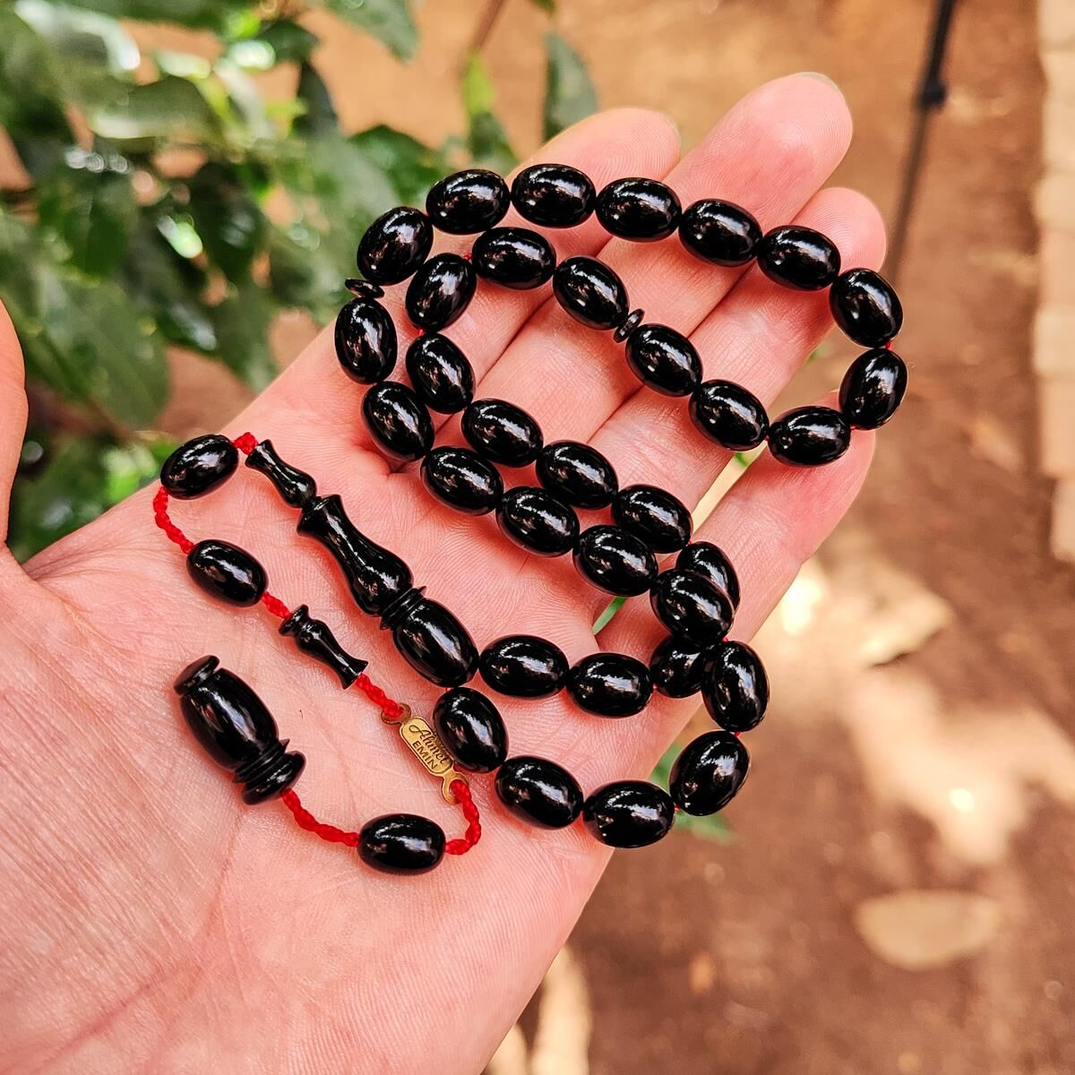 8x11 mm Ahmet Emin İmzalı Zümrüt Rengi Zar Kehribar Tesbih