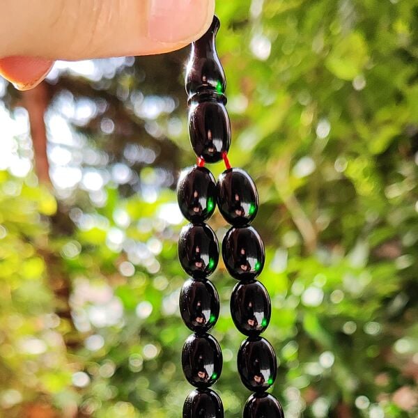 8x11 mm Ahmet Emin İmzalı Zümrüt Rengi Zar Kehribar Tesbih