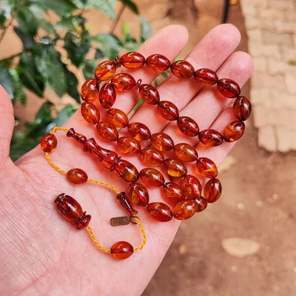 9x12 mm Ahmet Emin İmzalı Tütün Rengi Faturan Sıkma Kehribar Tesbih