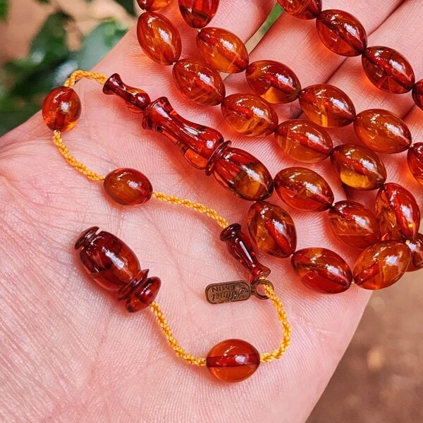 9x12 mm Ahmet Emin İmzalı Tütün Rengi Faturan Sıkma Kehribar Tesbih