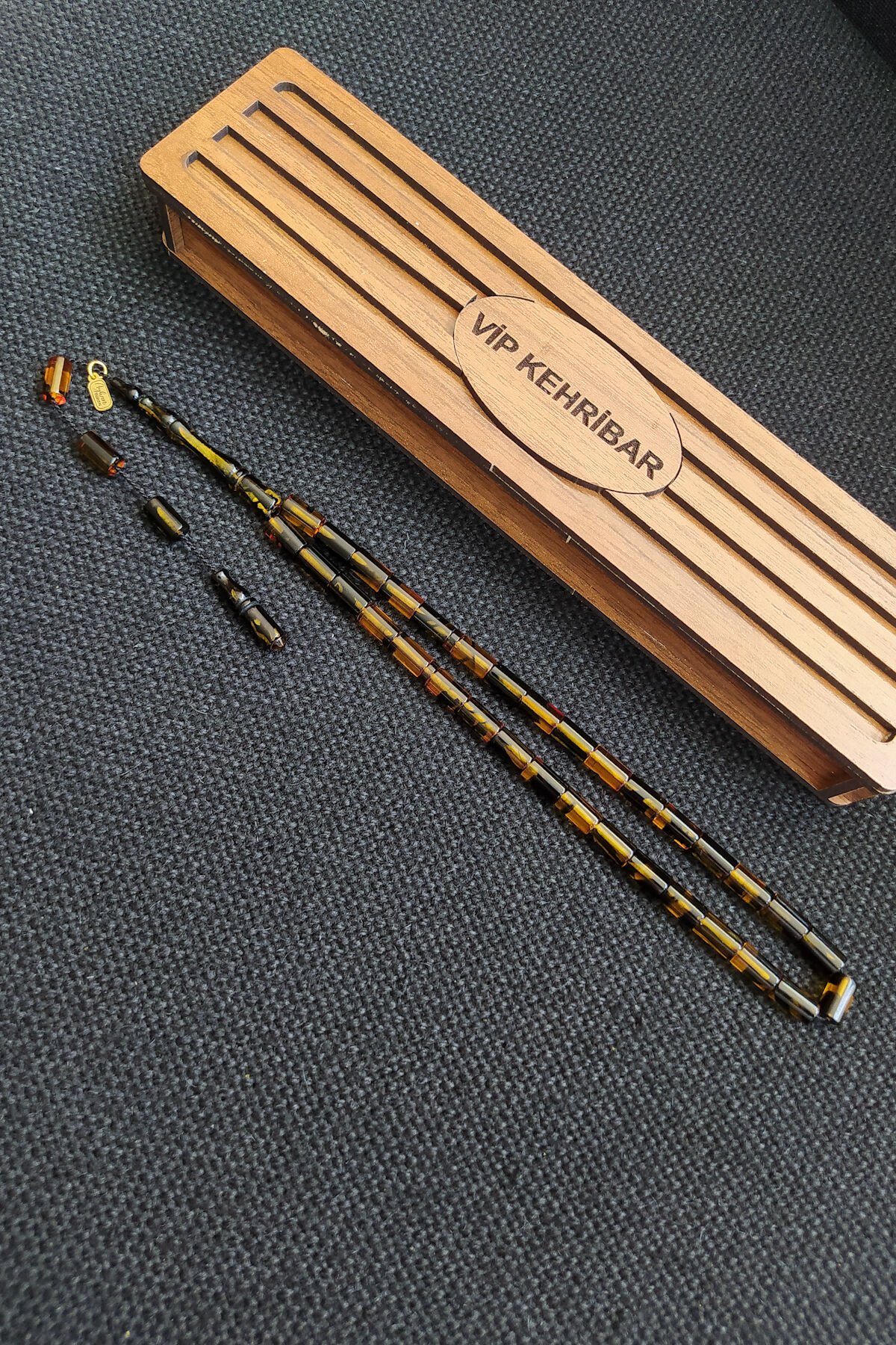 5,5x10 mm Kesme Ateşi Kehribar Tesbih Ayhan Turan Usta İşçilikli İmzalı Sistemli Tespih Ahşap Kutulu